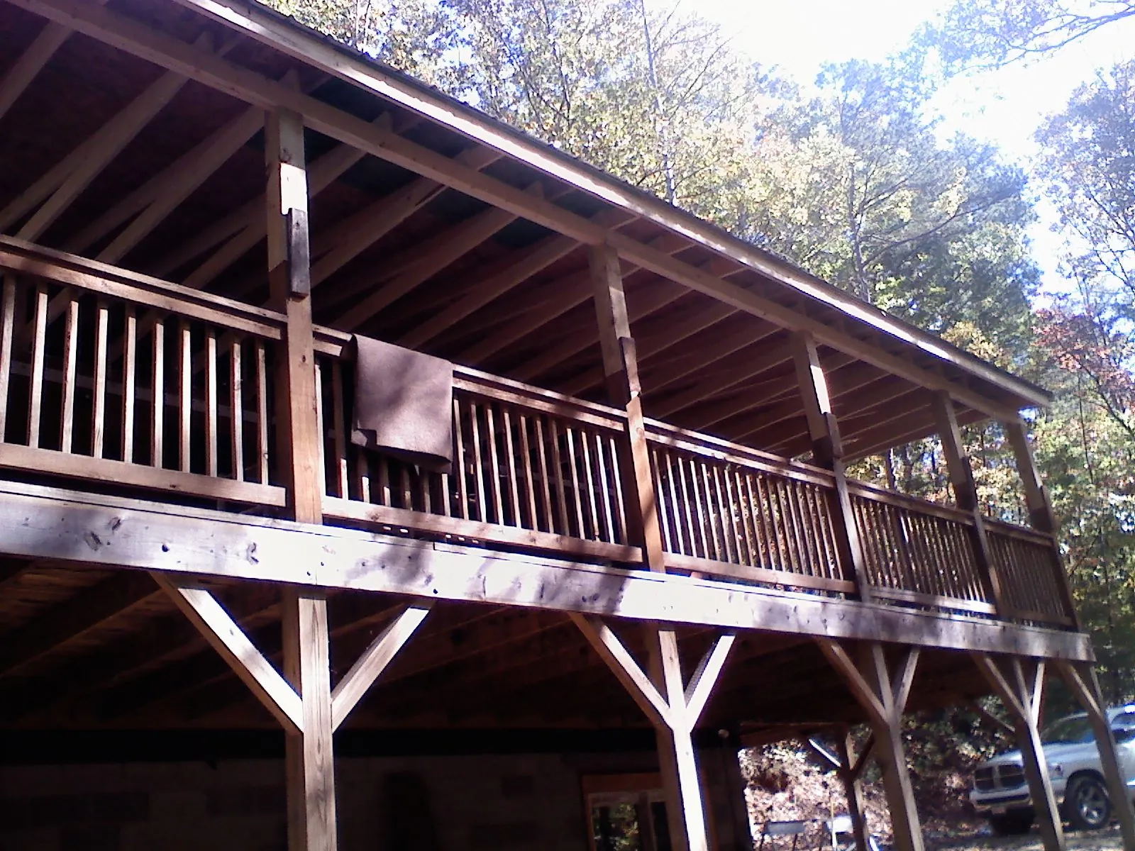 Timber framing under a new elevated porch and deck — Roof Leak Repair in Whitmore Lake by Roofing Brothers